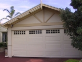 double-gable-carport-with-panel-lift-door